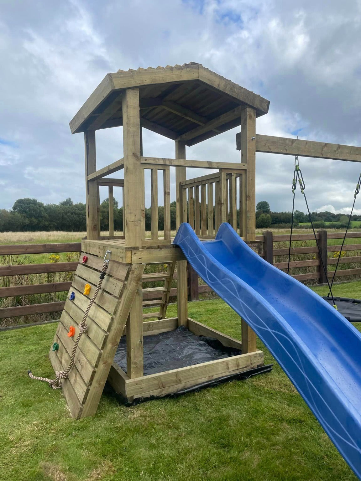 Thrilling Outdoor Escape: Swing Set with Slide, Nest Swing, and Exciting Additions