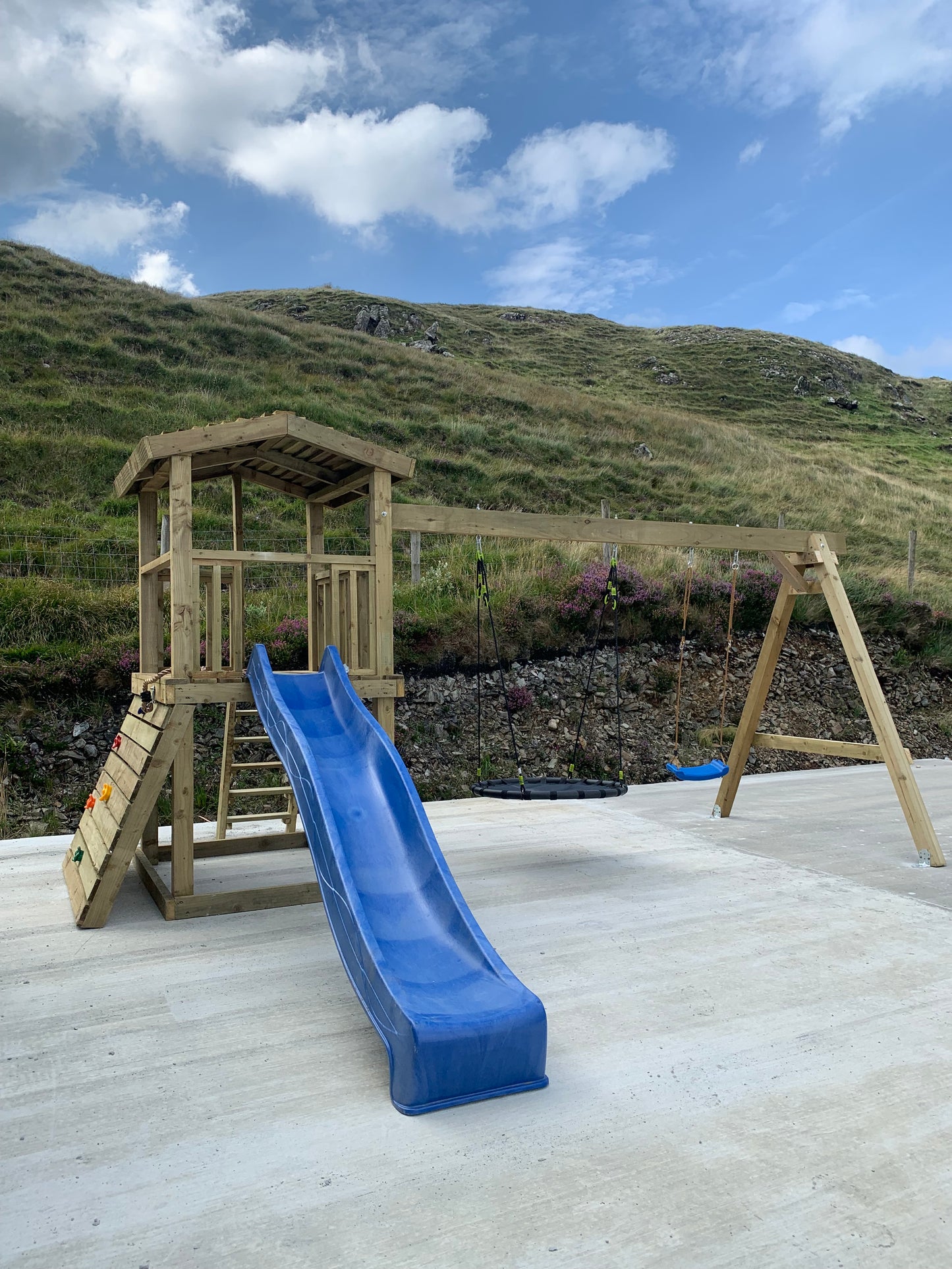 Thrilling Outdoor Escape: Swing Set with Slide, Nest Swing, and Exciting Additions